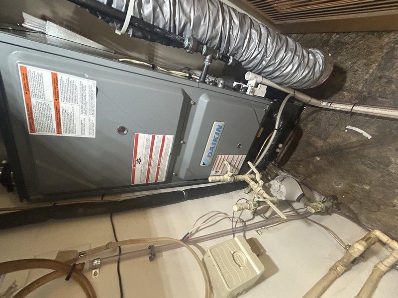 Completed Family Rewards cooling maintenance visit on residential HVAC system. Performed comprehensive air conditioner tuneup including operational testing, air filter replacement, and condensate drain clearing. Cleaned condenser coil and inspected all exterior components. During diagnostic testing, identified weak capacitor on compressor side. Verified refrigerant pressures and temperatures within manufacturer specifications. Replaced defective capacitor to restore optimal system performance and prevent potential compressor failure.
