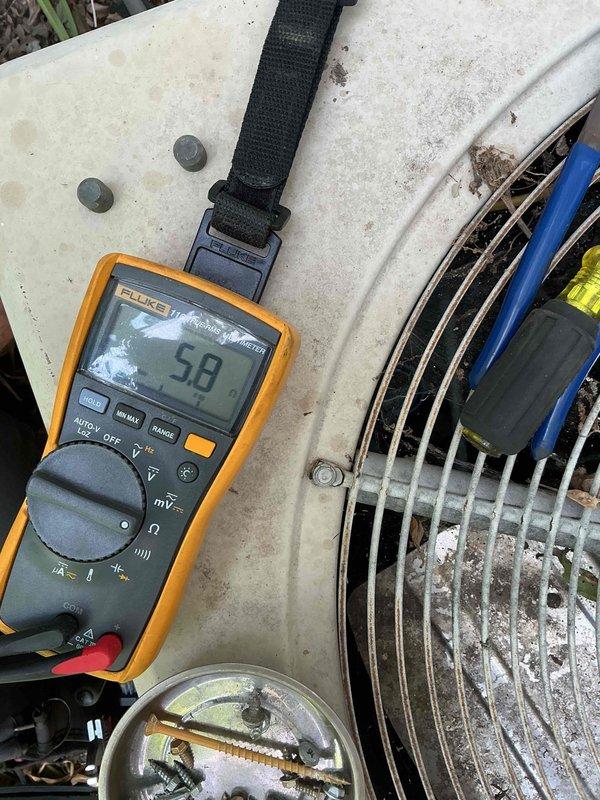 Responded to a no-cooling complaint on a 30-year-old Lennox R22 air conditioning system. Upon arrival, unit failed to start. Diagnostic testing revealed no 24-volt signal at the contactor or Y and C terminals at the control board. Performed jumper test between R and Y at thermostat, which successfully closed the contactor, confirming thermostat failure. With thermostat bypassed, only the condenser fan motor operated while compressor remained inactive. Conducted compressor winding resistance test using multimeter, which indicated excessive resistance through the common winding, confirming compressor failure. Due to company policy regarding discontinued refrigerant-side repairs on R22 systems, recommended complete system replacement. Coordinated scheduling with service advisor for system replacement consultation.