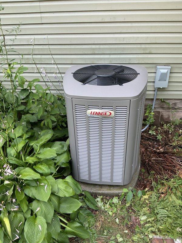 Performed comprehensive AC tune-up on 4-year-old Lennox outdoor unit. Rinsed condenser coil and exterior components to remove debris and improve heat transfer efficiency. Conducted full system inspection of all accessible components including electrical connections, refrigerant lines, and condensate drainage. System demonstrated proper operation with 15°F temperature split across the evaporator coil and active condensate production, confirming adequate cooling capacity and dehumidification. All components functioning within normal parameters at time of service completion.