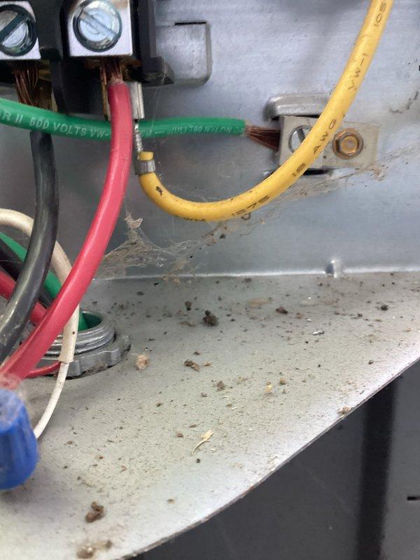Responded to no cooling complaint on Carrier air conditioning unit. Found contactor severely burned out with visible heat damage and white residue accumulation on the component body. Replaced failed contactor with new unit per PO# 241292-001. During troubleshooting, discovered compromised wiring that appeared damaged beyond the immediate connection point. Attempted to isolate and remove affected wire section, but determined the entire wire run may require replacement for safe, reliable operation. System restored to operational status with new contactor installed, though wiring concern was noted for future service consideration. Total service time approximately 2 hours.