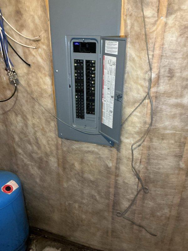 Responded to emergency call for electric water heater with smoke and fire damage. Upon arrival, confirmed water heater had caught fire with visible burn marks and damage to unit. Safely disconnected electrical supply at breaker panel and shut off water supply. Removed damaged 50-gallon electric water heater and installed new Bradford White 50-gallon electric water heater. Connected all copper supply lines, installed new shut-off valves, and ran flexible electrical conduit to breaker panel. Verified proper electrical connections, restored power, filled tank, and tested unit for proper operation and safety. All connections checked for leaks and system confirmed operational.