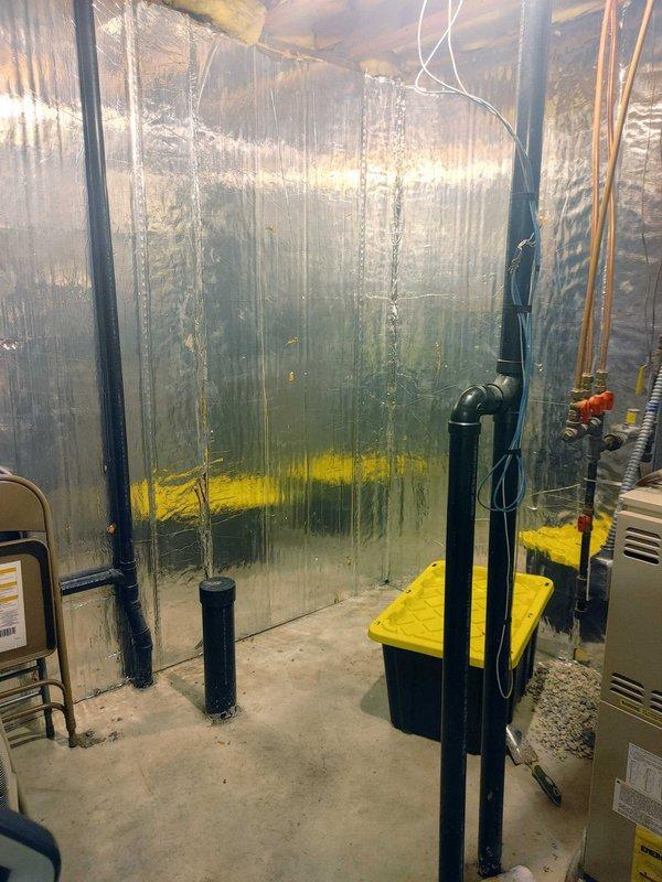 Conducted site assessment for basement bathroom rough-in installation. Evaluated existing conditions including concrete flooring, exposed joists, and reflective insulation barriers to determine optimal placement for toilet fixture and water supply line. Documented workspace conditions and provided detailed estimate to customer for complete rough-in plumbing work including waste line installation and cold water supply connection.