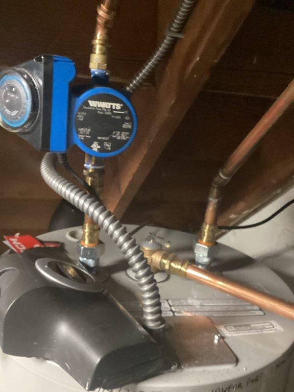 Performed comprehensive annual AC tune-up on 4-year-old Day and Night air conditioning system. Inspected and verified all major components including contactor, capacitor, condenser coil, control board, and evaporator coil—all found to be in good working condition. Confirmed proper amp draws, refrigerant charge levels, and temperature drop at 19 degrees, which is within manufacturer specifications. Furnace filter was clean and airflow was adequate.

Identified excessive humidity in mechanical room causing condensation on supply ductwork seam, resulting in water dripping onto floor. Recommended applying silicone sealant to affected ductwork seam once dried and installing dehumidifier in mechanical room to control ambient moisture levels and prevent future condensation issues. System is operating efficiently with no immediate repairs required.