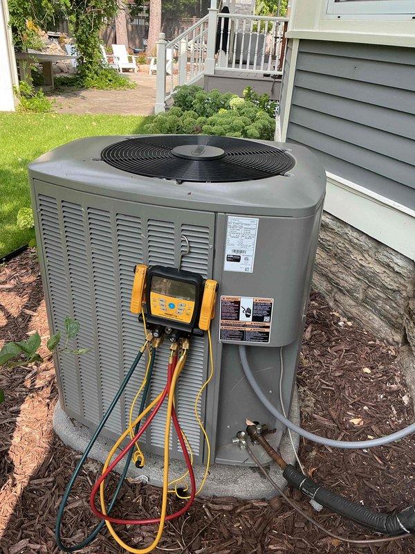 Completed annual cooling maintenance on a 3-year-old high velocity air conditioning system consisting of one air handler and one condensing unit. Performed comprehensive tune-up including refrigerant pressure and temperature measurements using digital manifold gauges, which confirmed proper refrigerant charge levels. Inspected and verified all system components are operating within manufacturer specifications. System is fully operational as designed. Noted basement area lacks supply vents in current configuration, resulting in limited cooling to that space; recommended mini-split system installation as potential solution for basement climate control.
