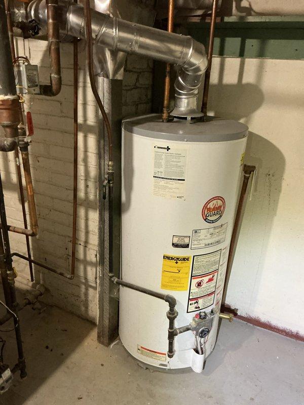 Responded to water leak in second-floor bathroom shower. Accessed property using provided entry code with authorization to complete work in absence of occupant. Removed existing dual valve shower system that was causing leak. Installed two owner-supplied Delta shower valves as replacements. Wall required demolition to access plumbing connections, exposing copper supply lines and drain pipes within stud cavity. Completed valve installation and verified proper operation with no active leaks upon completion.