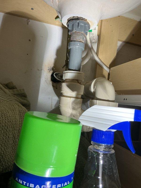 Responded to basement bathroom requiring replacement of worn tub spout and pop-up drain assembly. Removed existing fixtures and installed new chrome Moen slip-fit tub spout and complete pop-up drain assembly with overflow plate and stopper mechanism. Verified all threaded connections were properly sealed, tested water flow through new spout, confirmed pop-up stopper operation, and inspected all connections for leaks with system under pressure. All fixtures functioning correctly upon completion.