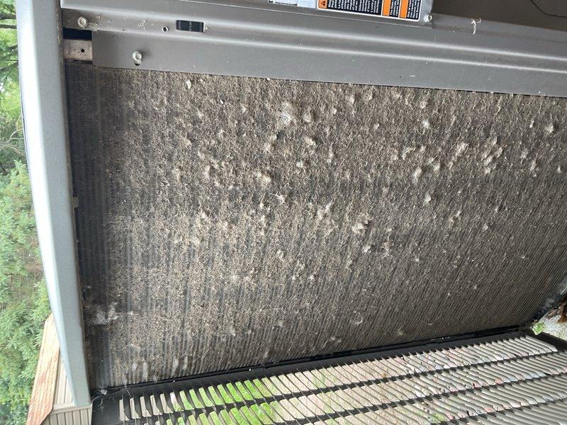Responded to callback for Lennox AC system not maintaining temperature following recent tune-up. Upon inspection, found heavily soiled and deflected air filter blocking airflow, causing inadequate cooling performance. Educated homeowner on proper maintenance schedule, emphasizing 30-day filter replacement intervals based on home size and system requirements to prevent future performance issues.