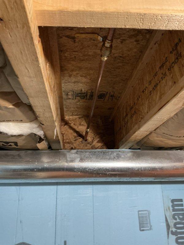 Responded to a frozen and cracked hose bibb that resulted from improper installation and inadequate drainage. The exterior spigot supply line, approximately 3 feet in length, sustained freeze damage due to incorrect grading that allowed water to remain trapped in the fixture. Removed the damaged hose bibb, installed a new frost-proof hose bibb with proper pitch to ensure complete drainage, and verified the dedicated shut-off valve was functioning correctly to allow for seasonal winterization.