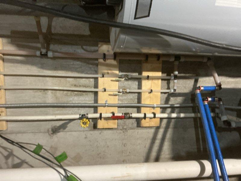 Responded to no hot water complaint and performed annual plumbing inspection. Diagnosed tanked water heater issue and determined the breaker for the power vent had tripped, causing loss of hot water. Reset breaker to restore power to the water heater power vent system. Conducted comprehensive plumbing inspection of entire home, checking all fixtures, supply lines, drain lines, and water heating equipment. Verified water heater returned to normal operation after breaker reset. All plumbing systems inspected and found to be functioning properly with no active leaks detected.