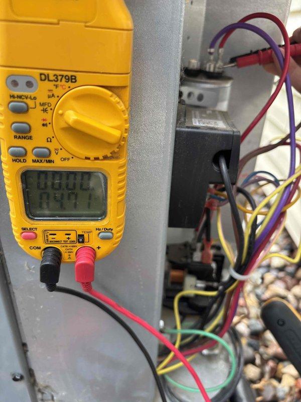 Completed annual cooling maintenance on one R-410A condenser unit with ambient temperature at 77 degrees. Performed comprehensive system inspection including air filter, thermostat operation, temperature split across evaporator coil, condenser unit components, coil cleanliness, motor operation, capacitor testing with digital multimeter, compressor function, refrigerant charge level, and condensate drain line. All electrical measurements were within manufacturer specifications, and system is operating normally with no deficiencies noted.