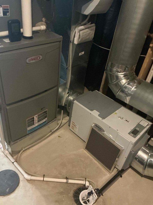 Completed comprehensive tune-up on 4-year-old Lennox furnace and air conditioning system. Performed standard maintenance procedures including inspection of electrical connections, air handler components, and ductwork. Customer had noted airflow concerns; system evaluated and found operating within normal parameters with no issues identified requiring immediate attention.
