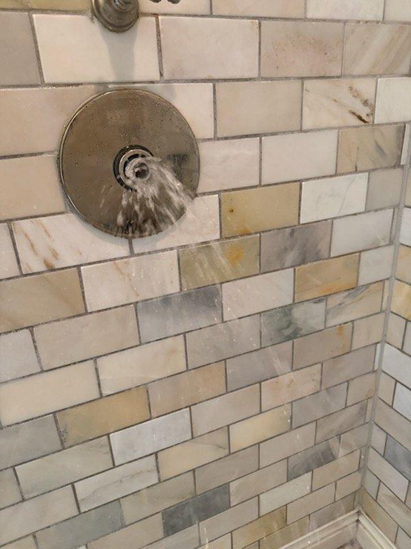 Responded to service call for inoperative master bathroom shower with broken cartridge. Diagnosed failed cartridge in shower valve assembly and instructed homeowner on isolation procedure to shut off water supply to the affected fixture while maintaining water service to remainder of residence. Discussed replacement options with homeowner, who elected to defer repair due to planned bathroom remodel. Successfully isolated shower valve, restored water service to house, and verified no leaks present in system upon completion.