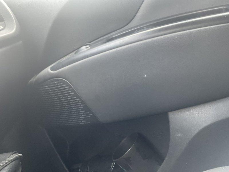 Conducted scheduled phone follow-up to review detailed estimate with customer and address questions regarding air conditioning system replacement scope and pricing breakdown. Documented vehicle interior conditions with photos showing dashboard, glove compartment area, and ventilation components for service records.