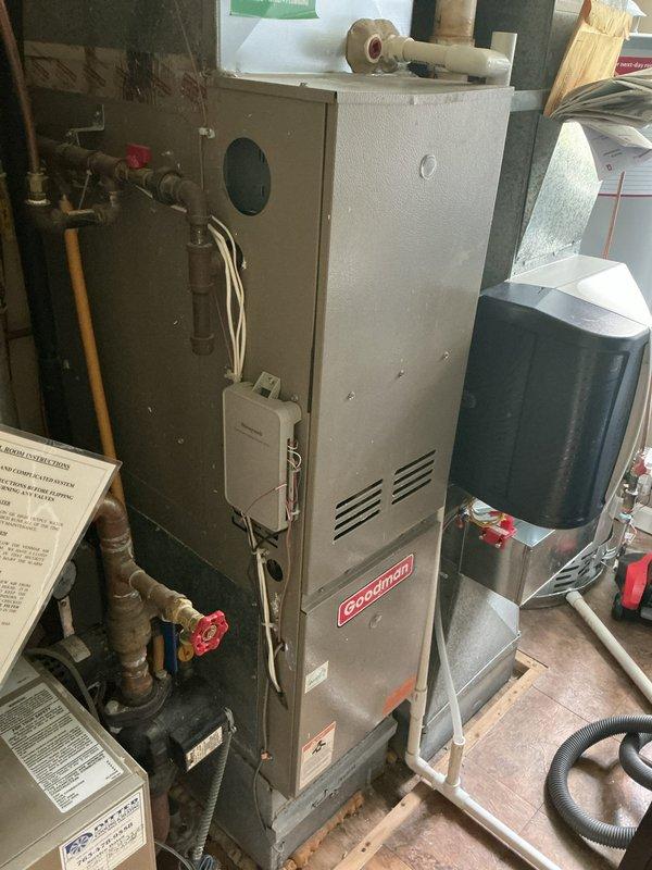 Performed annual AC maintenance inspection on Empire system and discovered unit operating with low refrigerant charge of obsolete refrigerant type, indicating system leak causing inadequate cooling performance throughout summer. During comprehensive inspection, identified critical safety hazard: furnace heat exchanger severely rusted with visible cracks, allowing carbon monoxide leakage outside system envelope. Immediately red-tagged furnace as unsafe for operation due to carbon monoxide hazard. Scheduled same-day estimate for furnace replacement and full HVAC system replacement options, with customer proceeding to replace both furnace and AC system.