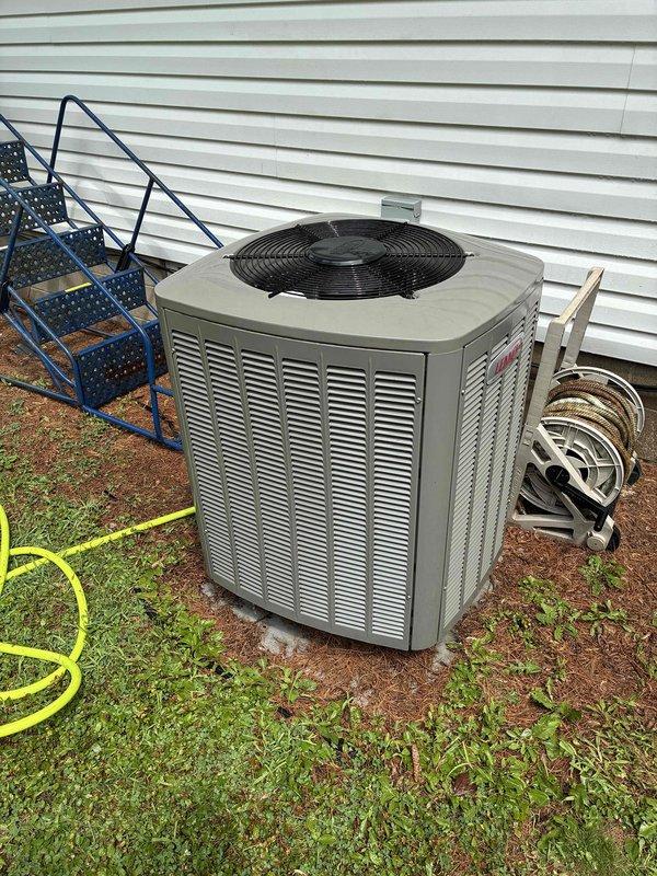Performed preventive maintenance on 5-year-old residential air conditioning system in response to concerns about inadequate cooling below 72°F during hot weather. Conducted comprehensive inspection including condenser coil cleaning, air filter verification, condensate drain line clearing, and electrical component testing. All measurements including temperature differential were within manufacturer specifications, air filter was clean, and all electrical components in condenser unit tested within normal operating parameters with no deficiencies identified.