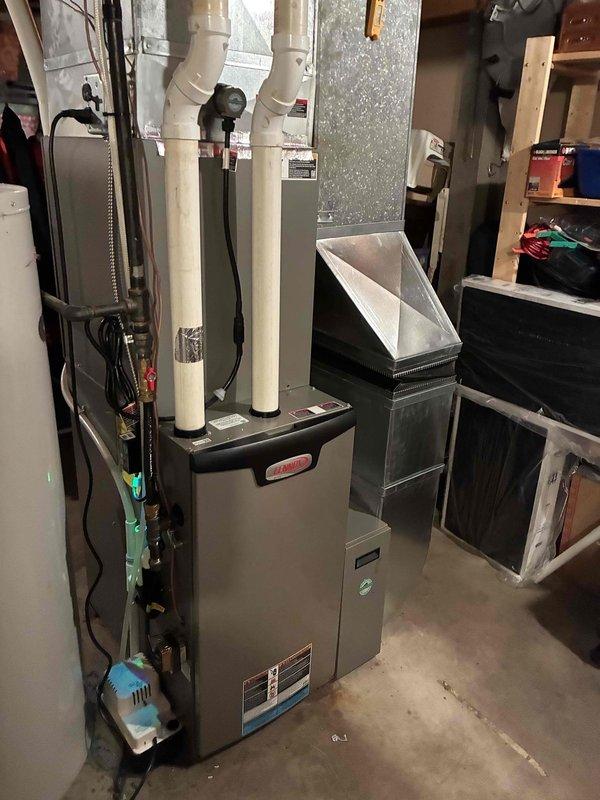 Performed preventive maintenance on 5-year-old residential air conditioning system in response to concerns about inadequate cooling below 72°F during hot weather. Conducted comprehensive inspection including condenser coil cleaning, air filter verification, condensate drain line clearing, and electrical component testing. All measurements including temperature differential were within manufacturer specifications, air filter was clean, and all electrical components in condenser unit tested within normal operating parameters with no deficiencies identified.