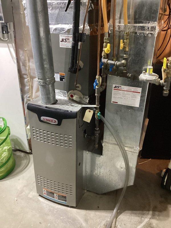 Responded to no-cool call on Lennox HVAC system with blank thermostat and no airflow. Found furnace power switch in off position at equipment, restored power to system. Performed condenser coil cleaning to ensure proper heat rejection and system efficiency.