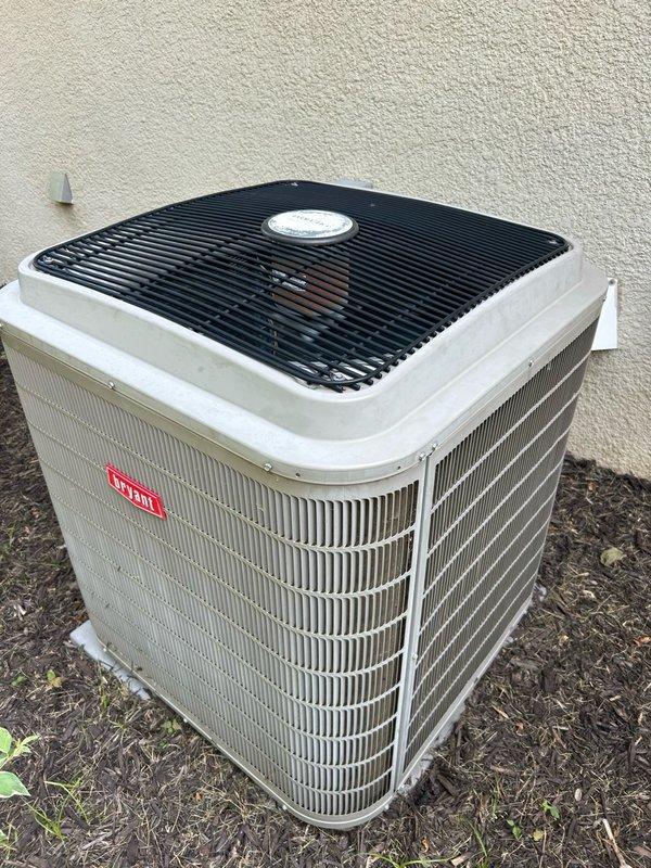 Completed comprehensive AC tune-up and maintenance inspection on Bryant condensing unit and Lennox thermostat system. Verified thermostat operation and programming, inspected air filter condition, examined blower assembly components, tested electrical connections including contactor and capacitor, checked condensate drain line for proper flow, and measured refrigerant performance with temperature split readings. Noted outdoor coil requires cleaning due to accumulated debris and dirt buildup. All electrical readings, refrigerant levels, and system performance measurements within manufacturer specifications with no mechanical defects or safety hazards identified. System currently operating properly. Recommended maintaining regular filter changes, scheduling periodic coil cleaning for both indoor and outdoor units, and continuing routine preventive maintenance to ensure optimal efficiency and longevity.