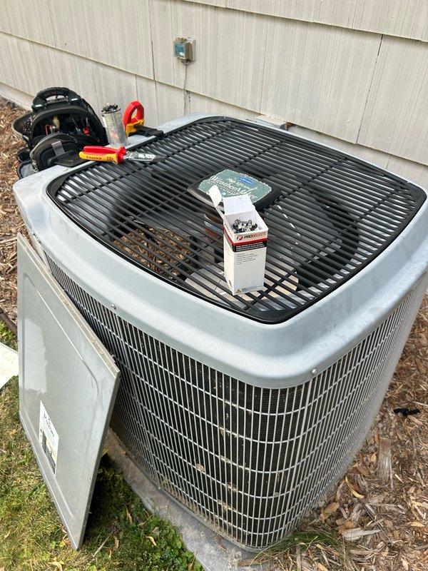 Responded to no cooling complaint on 25+ year old Weathermaker unit producing deep vibrating sound. Found failed dual run capacitor with compressor terminal reading open and fan terminal at 5.0 µF; condenser humming confirmed capacitor failure. Replaced dual run capacitor and extremely dirty air filter. Post-repair system testing revealed refrigerant circuit operating improperly. Customer informed of refrigerant issue and system malfunction but declined further repairs and equipment replacement at this time.