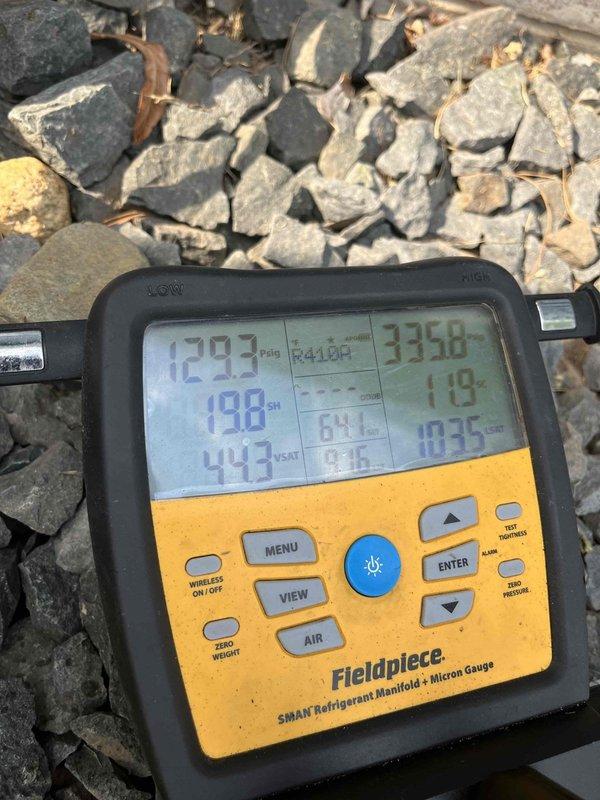 Responded to cooling capacity complaint where unit would not cool below 76 degrees. Upon arrival, verified inadequate temperature split of only 15 degrees across evaporator coil. Performed comprehensive system diagnostics including airflow verification, component inspection, and refrigerant pressure analysis. Filter had been recently replaced and no coil icing present. Manifold gauge readings indicated system was undercharged. Added refrigerant to manufacturer specifications and injected UV dye into system for potential future leak detection, as unit has required refrigerant addition previously despite being under warranty. After charging system to proper levels, achieved improved temperature split of 18 degrees. Advised customer to monitor system performance and contact for follow-up if cooling issues persist, at which point leak detection and additional component testing would be performed.
