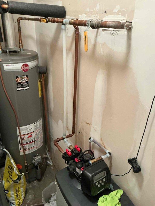 Responded to a bathroom sink drain clog caused by hair accumulation in the pop-up assembly. Removed and cleaned the pop-up drain assembly, clearing all hair buildup and debris from the drain mechanism. Tested water flow after reassembly to confirm proper drainage was restored.