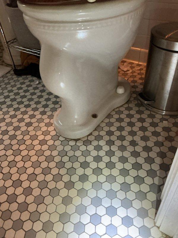 Responded to service call for shower temperature issue and toilet replacement evaluation. Upon inspection, found incorrect trim and cartridge installation on shower valve causing lack of hot water. Adjusted temperature limiting mechanism on existing valve to restore proper hot water function. Assessed gravity-fed toilet with pull chain mechanism for replacement and provided estimate for new toilet installation. Evaluated exterior spigot requiring repair and provided bid for replacement. Documented existing conditions including vintage hexagonal tile flooring and current fixture configurations for future reference.