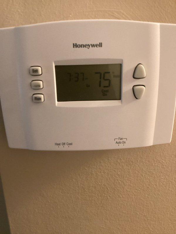 Completed annual preventive maintenance cooling visit on 10-year-old rooftop AC unit. System was found to be low on R-22 refrigerant; recharged unit to proper operating levels. Unit is functioning properly following service and refrigerant replacement.