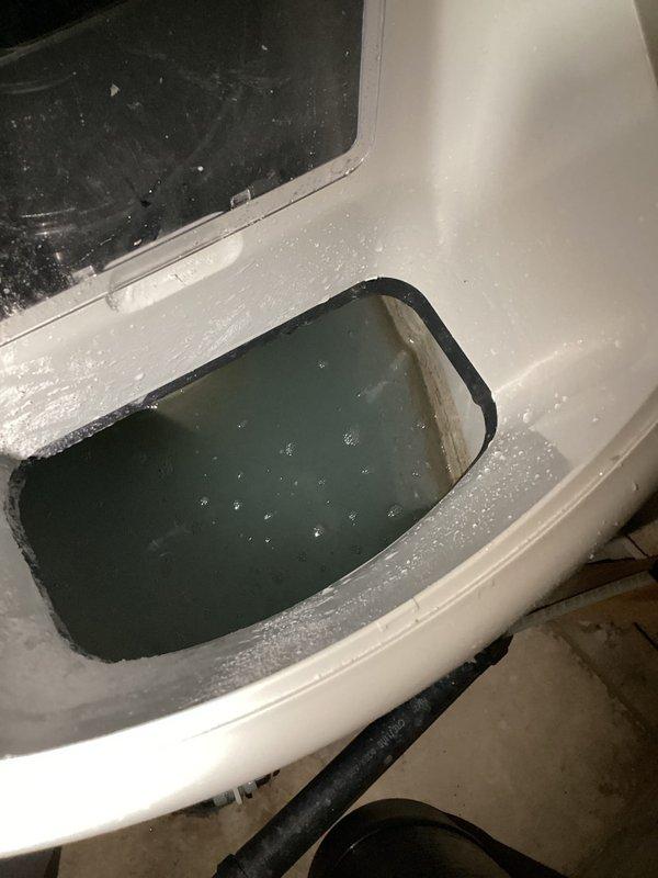 Responded to service call for water softener not flushing properly with excessive water in brine tank. Upon inspection, determined system was low on salt, which prevented normal regeneration cycle. Added salt to brine tank and manually initiated brine draw cycle for 20 minutes to reduce water level and restore proper system operation.