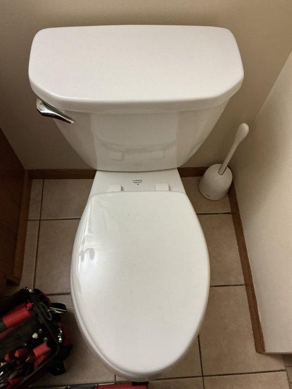 Responded to a clogged toilet that was backing up when flushed. Upon arrival, confirmed the fixture was plugged and observed black debris floating in the tank. Successfully cleared the blockage using a toilet auger to restore proper drainage. Additionally, replaced the tank-to-bowl gaskets to address the contamination issue and ensure a proper seal between components. Tested the toilet after repairs to verify normal flushing operation and proper water flow with no further backup or leakage.