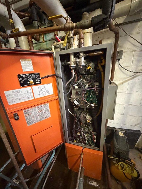 Responded to no hot water condition at commercial property with private well system. Upon arrival, determined that well pump control board had overloaded overnight, causing both tanked water heaters (Unit A and Unit B) to shut down. 

Diagnosed Unit A displaying heat exchanger error code related to water pump circuit. Verified pump operation was functioning correctly. Identified heat exchanger electrode requiring replacement, which property owner will order. Performed cleaning of lower heat exchanger electrode on Unit A to restore optimal operation.

Inspected Unit B and found non-functional display screen, which property owner will also order for replacement. Cleaned lower heat exchanger electrode on Unit B as preventive maintenance.

Successfully restored both water heating units to operational status during service visit. Explained to property owner that units may require manual reset once well pump control board issue is resolved, as ongoing electrical instability from well system 