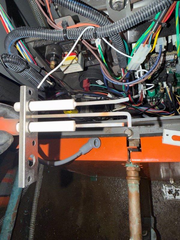 Responded to no hot water condition at commercial property with private well system. Upon arrival, determined that well pump control board had overloaded overnight, causing both tanked water heaters (Unit A and Unit B) to shut down. 

Diagnosed Unit A displaying heat exchanger error code related to water pump circuit. Verified pump operation was functioning correctly. Identified heat exchanger electrode requiring replacement, which property owner will order. Performed cleaning of lower heat exchanger electrode on Unit A to restore optimal operation.

Inspected Unit B and found non-functional display screen, which property owner will also order for replacement. Cleaned lower heat exchanger electrode on Unit B as preventive maintenance.

Successfully restored both water heating units to operational status during service visit. Explained to property owner that units may require manual reset once well pump control board issue is resolved, as ongoing electrical instability from well system 