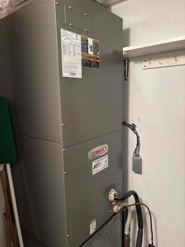 Performed comprehensive AC maintenance on rooftop Lennox system with R-410A refrigerant under 87-degree ambient conditions. Conducted full system inspection including thermostat operation, temperature split verification, condenser unit evaluation, evaporator and condenser coils, motors, capacitors, compressor operation, refrigerant charge levels, and condensate drain functionality. Replaced 20x20x1 air filter from van stock. Condenser coil cleaning was deferred due to lack of water access on rooftop; however, coils were found to be relatively clean upon inspection. All components tested within normal operating parameters with proper refrigerant charge and no deficiencies noted. System operating efficiently at time of service completion.