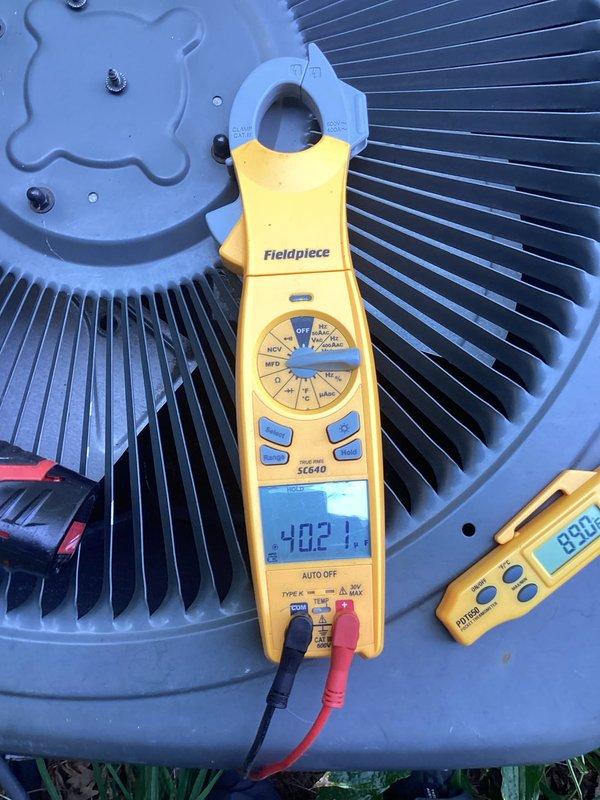 Responded to no cooling complaint on 15+ year old air conditioning system. Upon inspection, discovered restricted airflow due to dirty evaporator coil and clogged air filter. Replaced air filter, cleaned outdoor condenser unit, and verified refrigerant charge within acceptable parameters. Performed electrical diagnostics and confirmed proper amperage draw on compressor. System restored to operational status with improved cooling performance. Customer expressed interest in replacement options given age of equipment.
