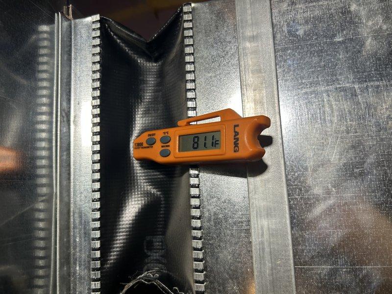 Responded to no cooling complaint on 9-year-old residential air conditioning system that failed following power outage. Diagnosed and replaced failed capacitor, performed condenser coil cleaning, and restored unit operation. System pressure and temperature analysis revealed low refrigerant charge with subcooling measuring 1°F against required 10°F, indicating potential leak in R-410A system. Provided repair options for leak detection and refrigerant recharge, with service advisor follow-up scheduled to monitor system performance.