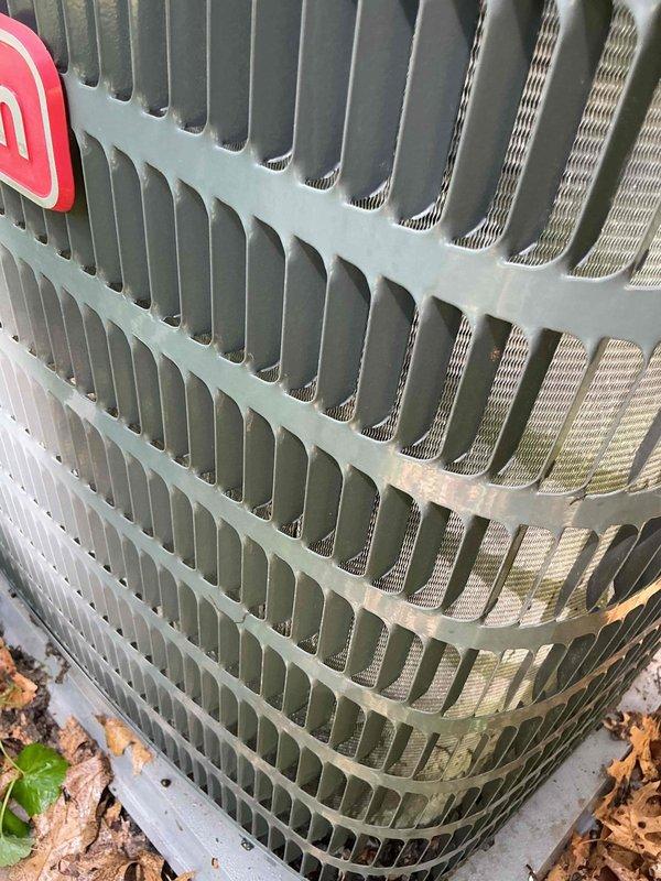 Responded to no cooling complaint on 10-year-old HVAC system. Upon inspection, found outdoor condenser coil heavily plugged with debris and dirt buildup, significantly restricting airflow and reducing heat transfer efficiency. Indoor furnace filter also found severely plugged. Thoroughly cleaned outdoor coil fins to restore proper airflow through the unit. Advised homeowner to replace furnace filter to maintain system performance. System airflow restored, unit operating properly after cleaning.