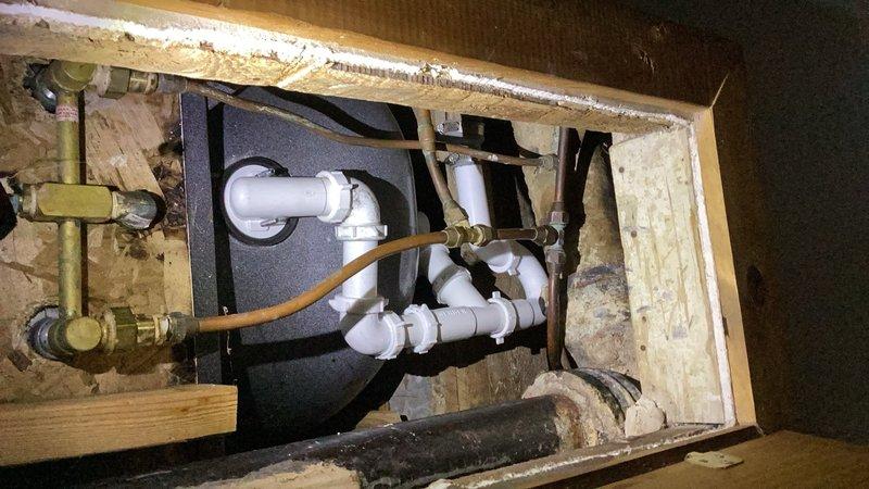 Responded to water leak originating from top floor tub/shower causing damage to first floor below. Upon inspection, identified source of leak at slip nut connection on 1-1/2" tub waste and overflow assembly. Removed and replaced defective tub waste and overflow unit. Resealed all joints and connections to ensure watertight installation. Tested system for proper drainage and verified leak was fully resolved with no further water intrusion to lower level.