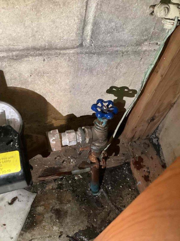 Responded to call for malfunctioning main water valve that was not opening fully. Upon inspection, found the existing 3/4" gate valve had failed due to age-related deterioration, with visible corrosion and rust on the piping assembly and mounting components. Shut off water supply and removed the deteriorated gate valve from the interior water line. Installed new 3/4" gate valve to restore full water flow control to the property. Tested new valve operation to ensure proper functionality and verified no leaks at connections. System returned to normal operation with full valve control restored.