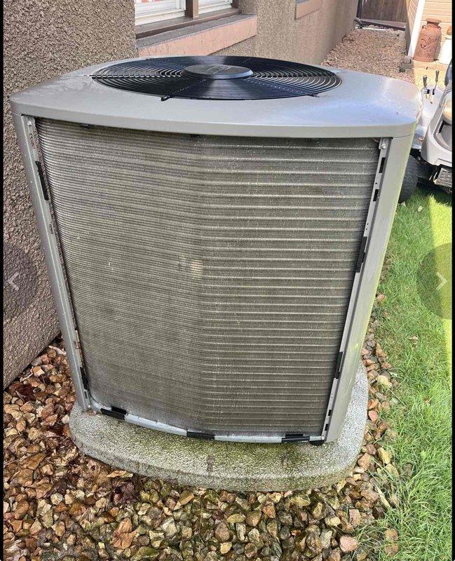 Responded to callback for insufficient cooling following recent maintenance on 2-ton residential A/C system. Upon arrival, thermostat set to 71°F with indoor temperature at 75°F during extreme ambient conditions (95°F outdoor temperature, 80% humidity). Installed gauges and measured refrigerant subcooling, which registered slightly elevated but within acceptable operating range. Determined unit capacity adequate for typical conditions but insufficient to overcome heat load from multiple contributing factors including active oven use, open tuck-under garage door, and extreme weather conditions. System operating properly with no mechanical defects identified. Provided customer education on managing internal heat sources and maintaining building envelope integrity during peak demand periods to optimize system performance.