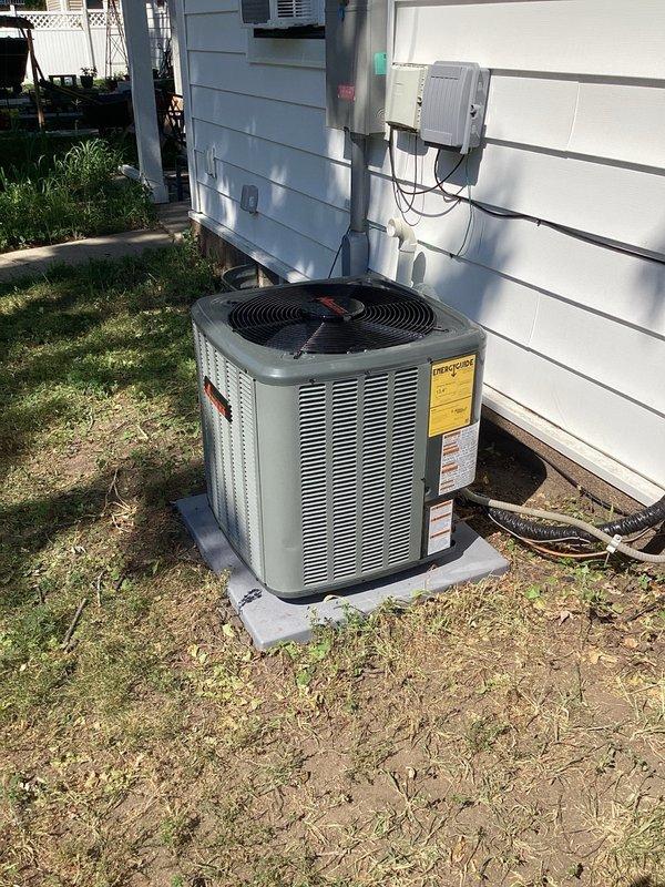 Responded to callback for recently installed 2-ton A/C system not cooling to temperature. Found system was overcharged with refrigerant causing excessively high pressures and poor performance. Removed excess refrigerant and corrected subcooling to approximately 9 degrees. Discovered blower motor was incorrectly wired with grey wire on cooling tap. Performed static pressure reading (0.6"WC) and rewired to blue wire tap for proper 785 CFM airflow appropriate for 2-ton capacity. Adjustments improved temperature drop from 10 degrees to 15 degrees across evaporator coil. Advised homeowner to monitor system performance and report any continuing issues.