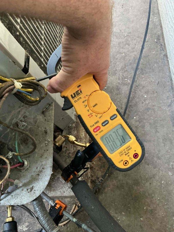 Responded to no cooling complaint on 19-year-old Bryant air conditioning system. Diagnosed and replaced failed dual capacitor, restoring cooling operation. System testing confirmed 20-degree temperature drop within specification, clean condenser and evaporator coils, clean filter, and functional contactor. Identified condenser fan motor showing early signs of seizure, indicating potential future failure. Due to system age and risk of additional component damage from capacitor failure, scheduled service advisor consultation to review replacement options. Offered secondary heat exchanger inspection on Bryant furnace but homeowner declined service at this time.