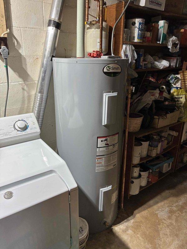 Responded to service call for loud noise and vibration from HVAC system during cooling operation. Upon inspection, discovered entire furnace shaking violently when blower motor engaged. Identified root cause as paper backing from air filter that had not been removed during previous filter change, which was subsequently pulled into blower wheel assembly causing severe imbalance. Removed foreign material from blower wheel, eliminating vibration and noise issue. Verified air conditioning unit operational age at 34 years with newer furnace installation. Connected manifold gauges to refrigeration system and confirmed operating pressures within acceptable parameters. Unit currently cooling effectively following repair. Discussed equipment age and reliability concerns with homeowner given the advanced age of outdoor condensing unit. Scheduled comfort advisor consultation for system replacement evaluation.
