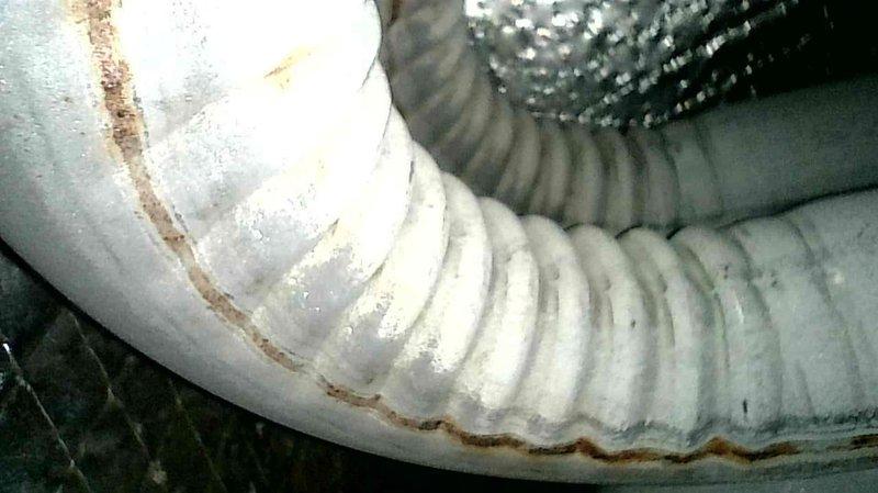 Responded to no-heat call on furnace under 10 years old. Upon arrival, found homeowner had recently replaced thermostat but unit still would not operate properly. Diagnosed ignition system failure where flame would light but would not remain lit. Tested control board and confirmed millivolt signal present, indicating faulty board as root cause of ignition lockout. Provided estimate for replacement control board installation. Homeowner opted to replace entire furnace system instead of proceeding with board replacement. Scheduled complete furnace replacement for following day.