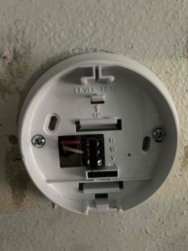 Responded to no-heat call on furnace under 10 years old. Upon arrival, found homeowner had recently replaced thermostat but unit still would not operate properly. Diagnosed ignition system failure where flame would light but would not remain lit. Tested control board and confirmed millivolt signal present, indicating faulty board as root cause of ignition lockout. Provided estimate for replacement control board installation. Homeowner opted to replace entire furnace system instead of proceeding with board replacement. Scheduled complete furnace replacement for following day.