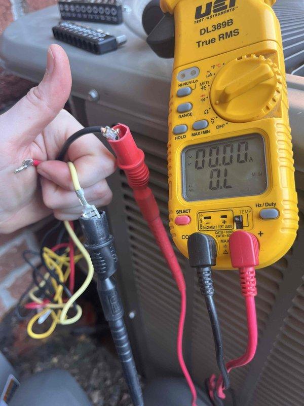 Responded to callback on 9-month-old AC installation with no cooling complaint. Upon diagnosis, confirmed compressor failure and identified improper installation with unit positioned directly against home exterior. Tested capacitor with digital multimeter to verify electrical component functionality. Replaced failed AC unit and relocated condenser 6 inches away from brick wall to ensure proper airflow and clearance per manufacturer specifications. Unit now operational with adequate spacing for maintenance access and optimal performance.