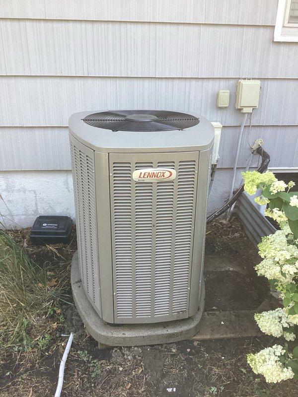 Responded to no cooling complaint on Lennox system installed one year ago. Upon arrival, confirmed indoor blower motor operating but outdoor unit not running. Diagnosed failed fuse in disconnect switch. Replaced both fuses in disconnect, restoring power to outdoor unit. Verified system startup and operation. Checked refrigerant charge and temperature split across evaporator coil—both within manufacturer specifications. Inspected outdoor condenser coil and found debris obstruction affecting airflow. Provided homeowner education on proper condenser coil cleaning procedures and recommended preventive maintenance agreement via email. System restored to normal operation with adequate cooling capacity.