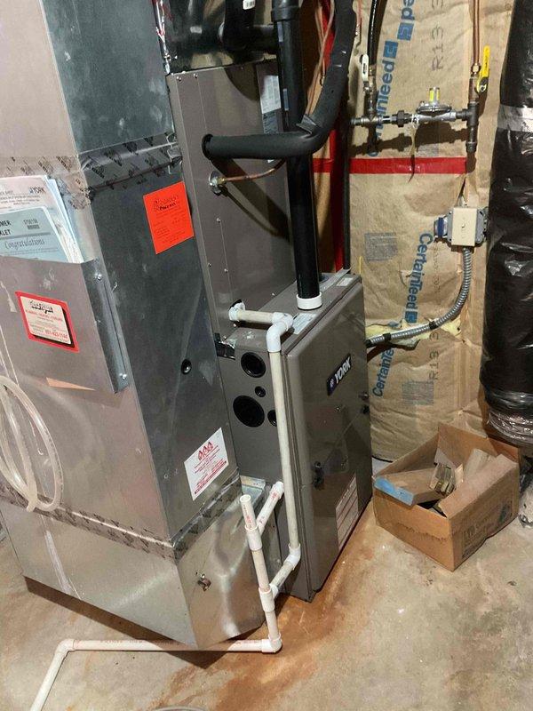 Responded to no hot water condition on Rheem tankless water heater displaying Code 11 error. Installed customer-supplied flush valve kit to enable routine maintenance and system flushing. Connected isolation valves to copper supply lines to facilitate future descaling procedures and cleaning of ignition components. Verified proper installation of flush port assembly and tested valve operation to ensure system accessibility for ongoing maintenance requirements.