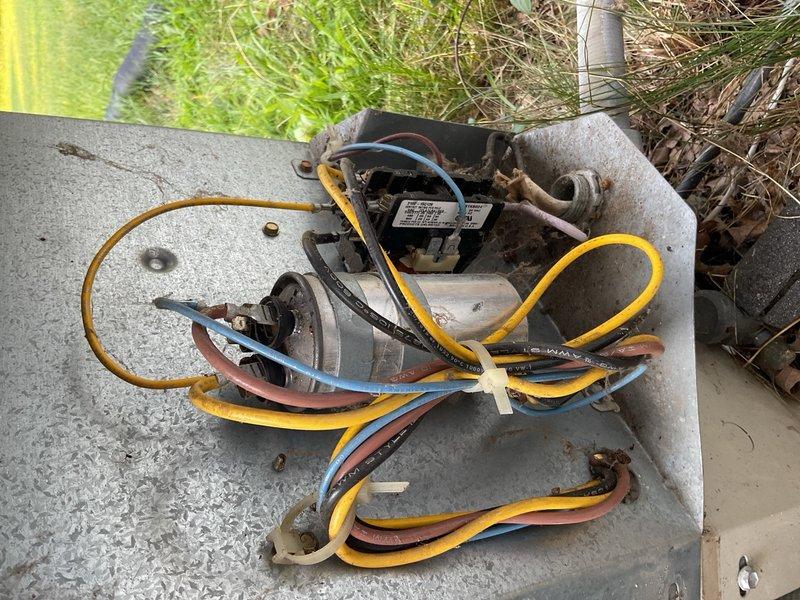 Responded to a no-cooling call on a 2002 ICP R-22 air conditioning system paired with a 2013 York high-efficiency furnace. Upon arrival, confirmed the outdoor unit would not start—neither the compressor nor condenser fan motor was running. Performed diagnostic testing on the outdoor dual run capacitor and found it had failed completely, testing at 0/0 µF versus its rated capacity of 30/5 µF. Visual inspection revealed the capacitor was visibly bulged and swollen, confirming internal failure. Replaced the failed dual run capacitor with a new unit matching the original specifications. Restarted the system and verified proper operation of both the compressor and condenser fan motor. Measured supply and return air temperatures and confirmed a 22°F temperature split, indicating the system was cooling normally and performing within acceptable parameters for an R-22 refrigerant system. During inspection of the mechanical room, discovered a 10-year-old Richmond electric water heater with activ