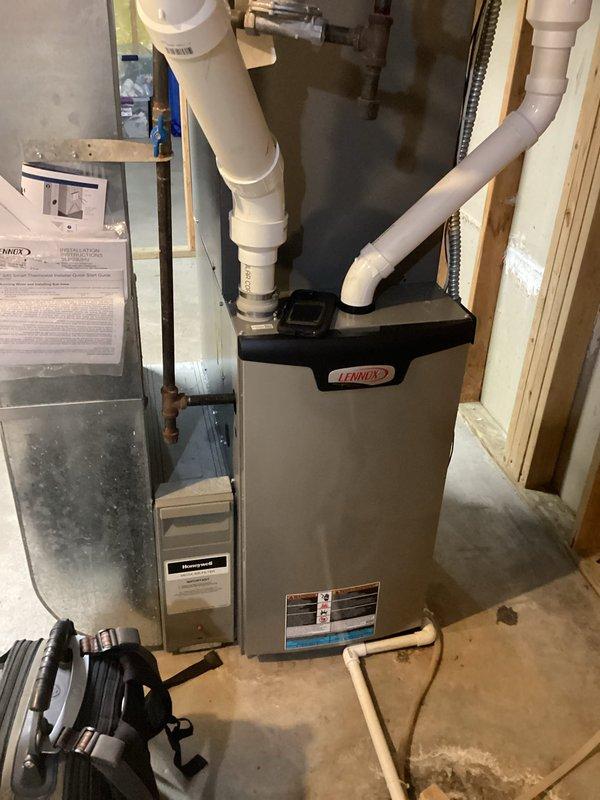 Completed comprehensive AC tune-up on Lennox heat pump system previously installed by our team. Performed full system inspection, verified proper operation of all components, cleaned outdoor condenser unit, confirmed filter condition and all electrical connections were secure. Customer reported minor condensation on ductwork during peak heat conditions, which was noted for monitoring but system is operating within normal parameters with no immediate concerns.