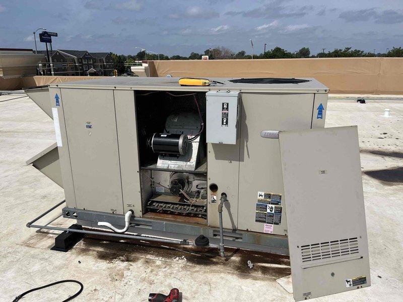 Responded to service call for rooftop unit at commercial strip mall location. Upon inspection, identified failed blower pulley requiring replacement. Removed access panel to blower compartment and replaced defective pulley with new component. Installed fresh air filters throughout the unit. Verified proper belt alignment and tension on new pulley assembly. Tested blower motor operation and confirmed unit returned to normal functionality. RTU is now operational and providing proper airflow.