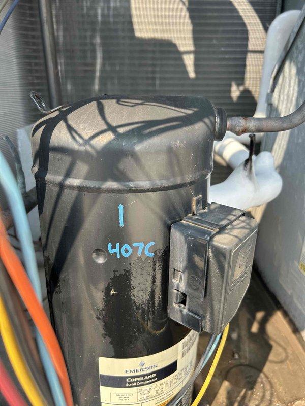 Responded to no cool call on commercial RTU serving bar area. Found issues with both heating/cooling stages preventing proper operation. Diagnosed compressor and staging control problems on unit utilizing 407C refrigerant. Performed necessary repairs to restore cooling operation and get system functional. Unit is now operational and providing cooling, though additional parts will be required on follow-up visit to ensure system maintains adequate capacity during peak temperature conditions.